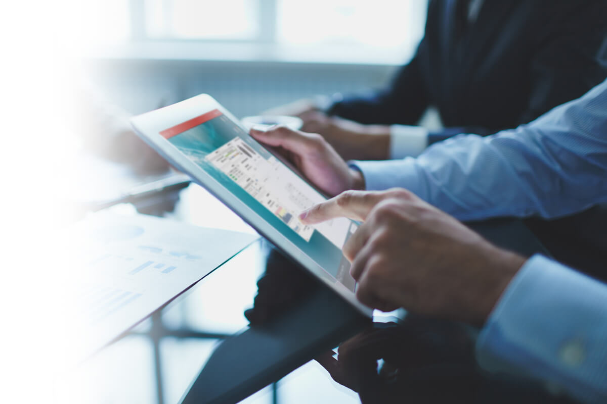 Business people working with a tablet