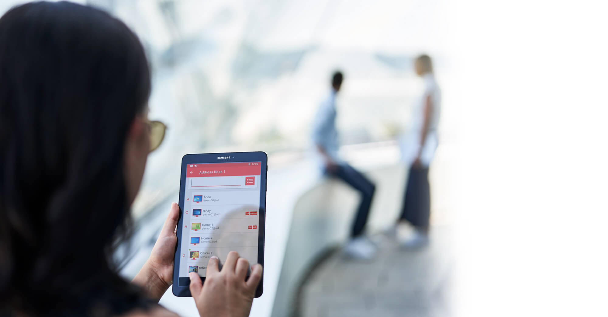 Woman viewing a tablet at the office