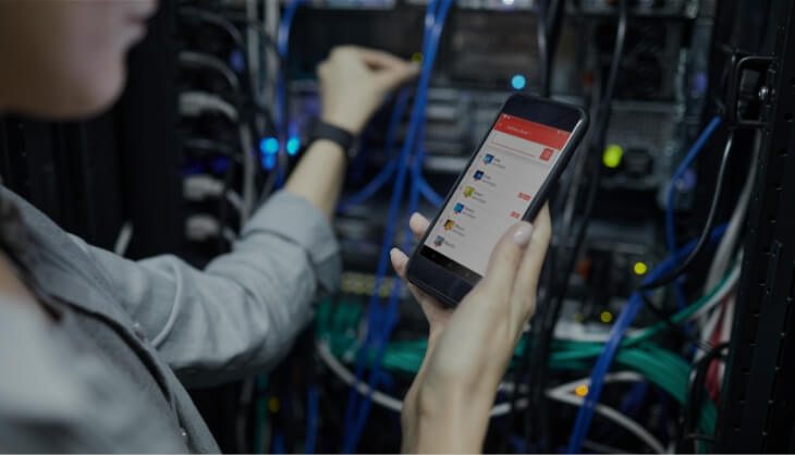 Woman working in server room